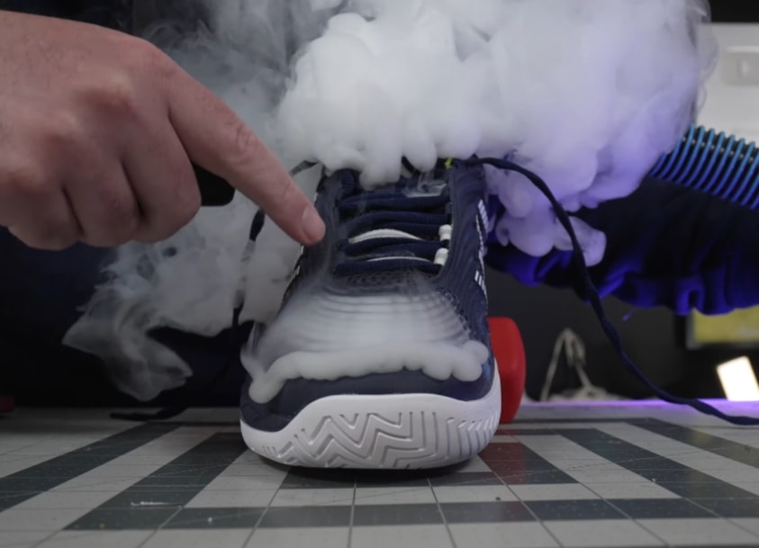 K-Swiss Hypercourt Supreme 2 pickleball shoe being tested for breathability with a steam pipe, showing limited airflow.